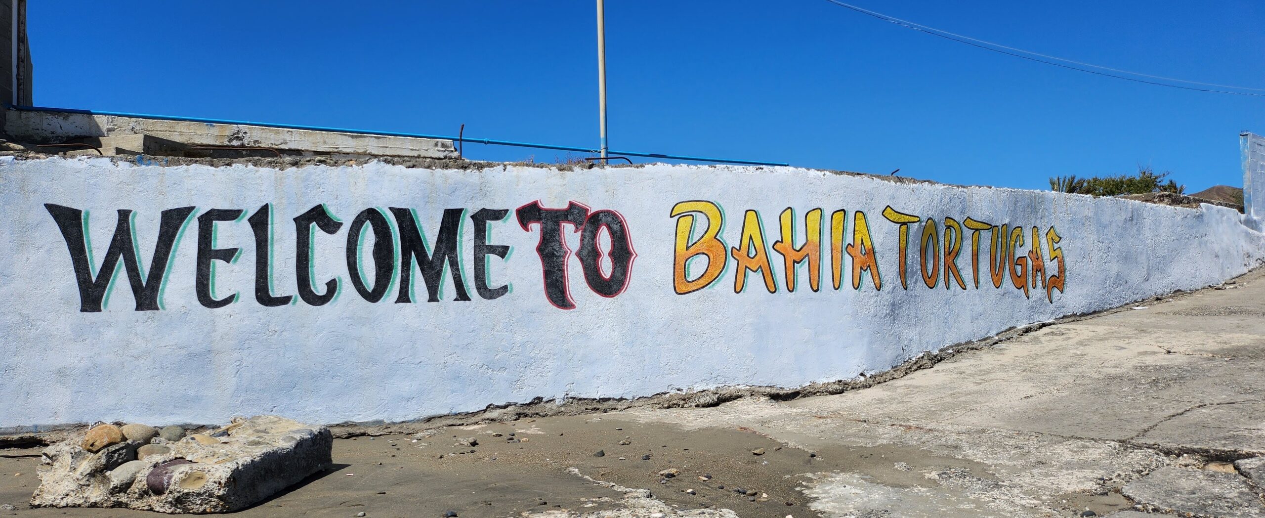 Hand painted welcome message on concrete wall